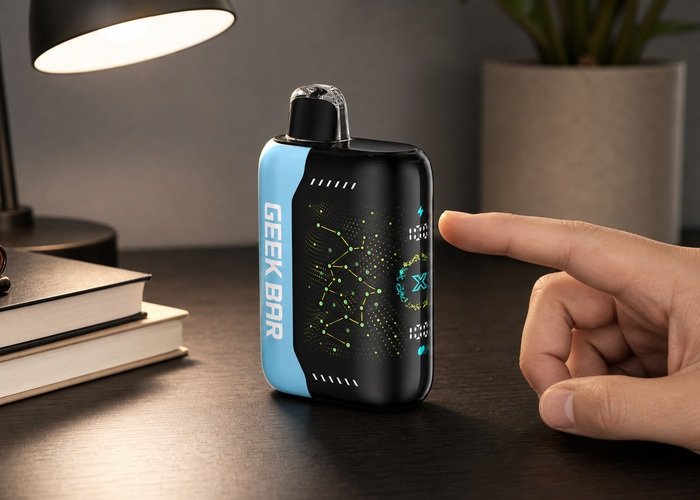 Adult pointing toward the battery and liquid display on a Geek Bar Pulse X