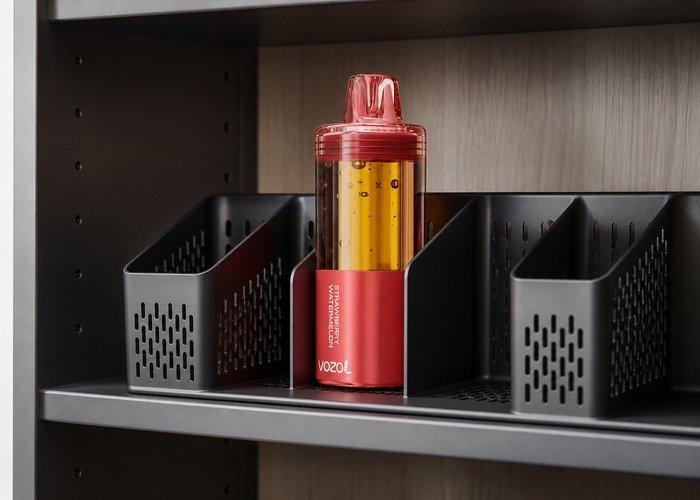 Adult storing intact VOZOL Mega 50K devices safely after comparison