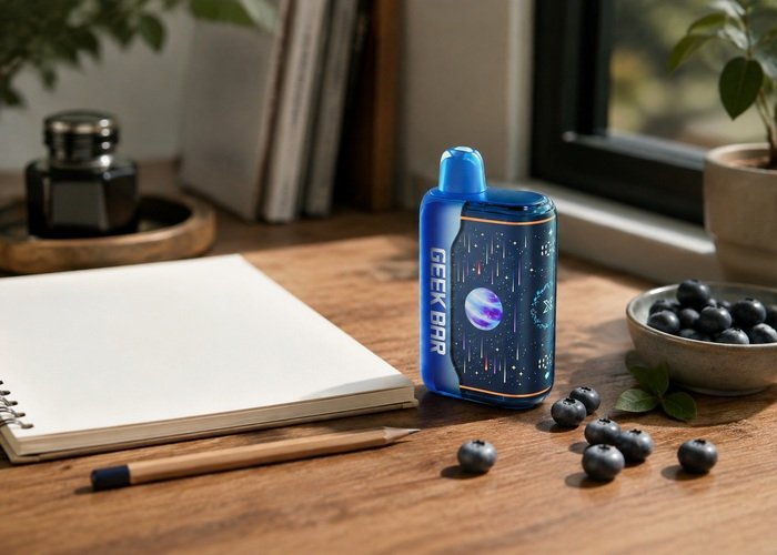Geek Bar Pulse X22 Blueberry Jam beside a blank tasting notebook and fruit